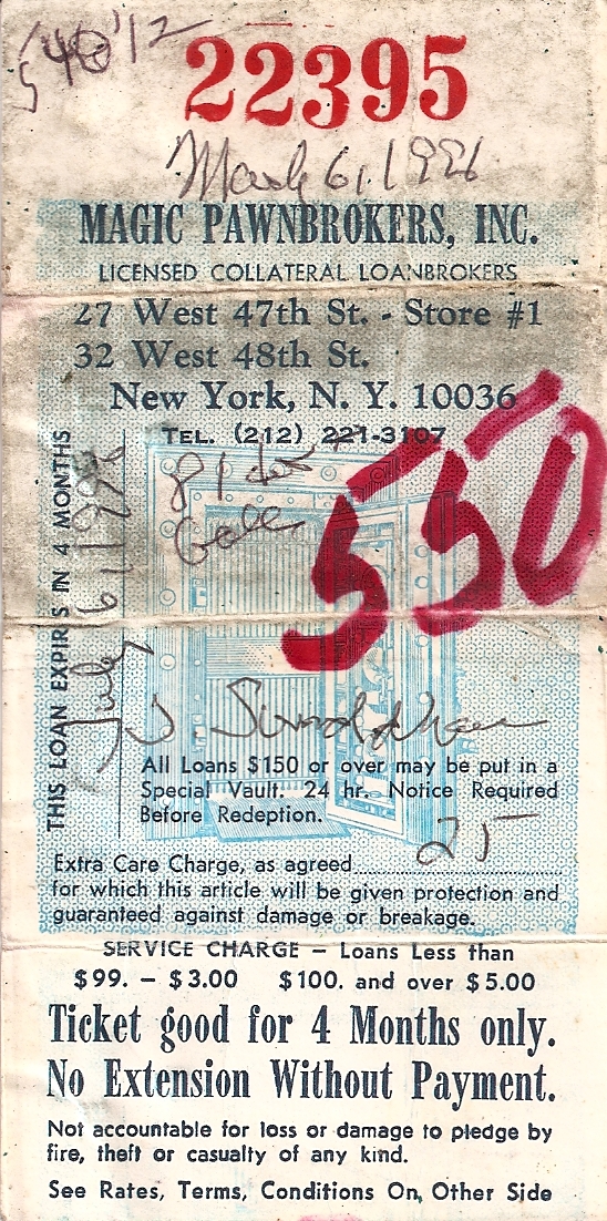 photo of warn and folded pawn ticket